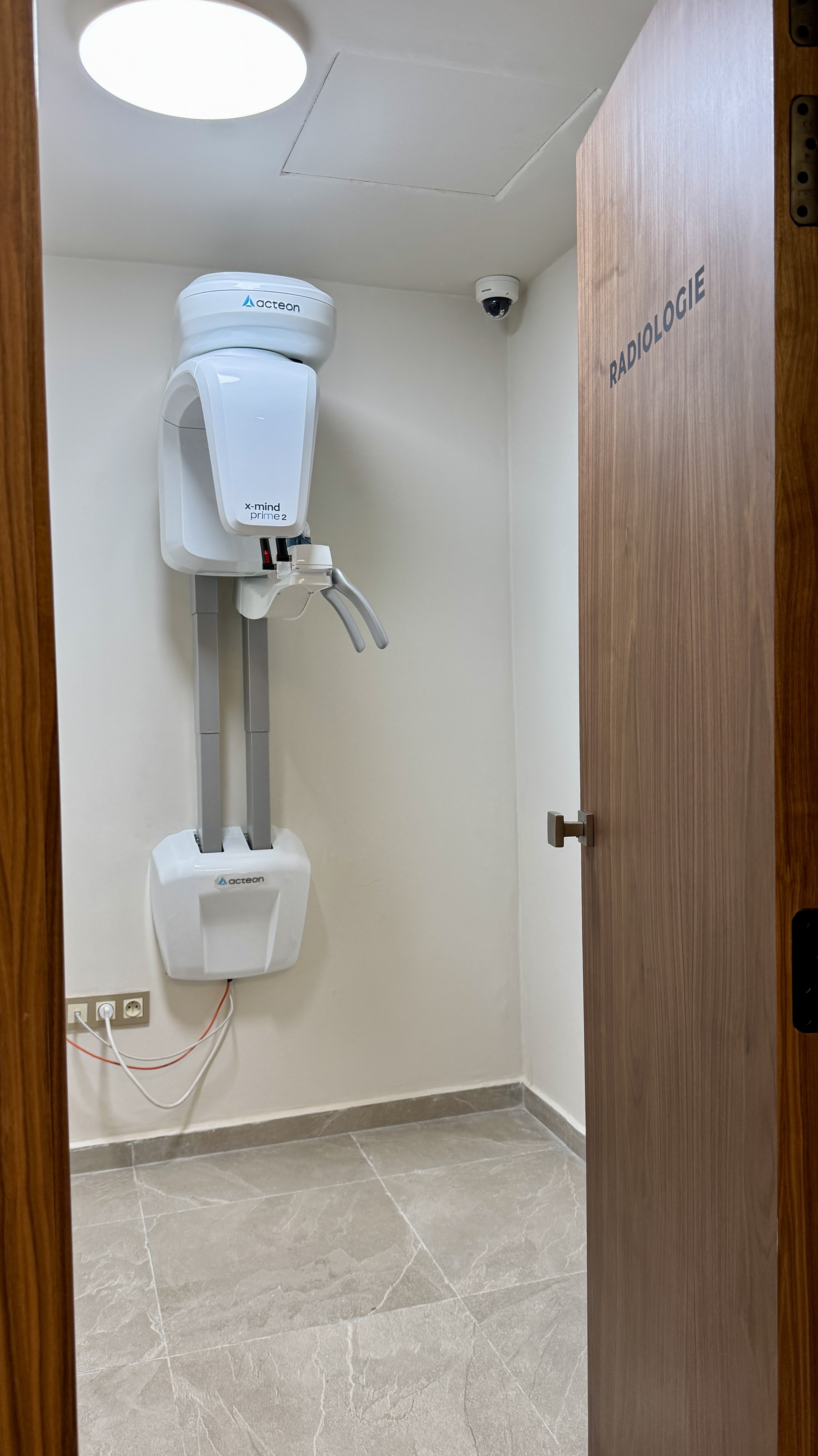 Child smiling in a dental chair